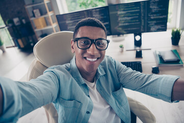 Self portrait of attractive student young positive guy working remotely employee technical support manager at workplace indoors home