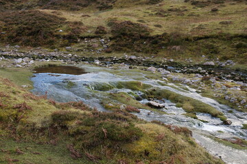 Naklejka na ściany i meble A Water Spring on the Allt nan Uamh (also known as Furan Allt nan Uamh, Fuaran Rising, Fhurain Rising), Inchnadamph, Assynt, Sutherland, North West Scotland, UK