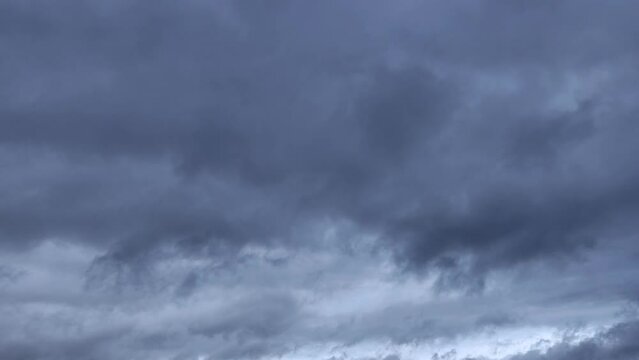 Impressive dark landscape of a cloudy storm devouring the little light that remains