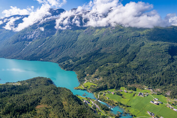 Fototapeta na wymiar Aerial view above the mountains, fjords and lakes of Norway during summer 