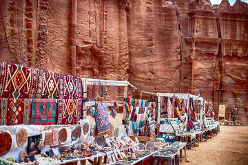 View of an open-air souvenir shop located along the Siq Canyon in the city of Petra, Jordan.