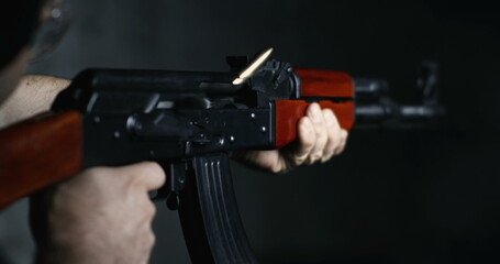 AK-47 Rifle Firing Captured in Ultra Slow-Motion 800fps, Shooter Aiming and Utilizing Speed-Ramp...