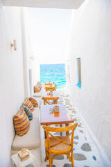 Mykonos, Greece. Wiew of whitewashed cycladic street in beautiful Mykonos town, Cyclades Greek Islands.