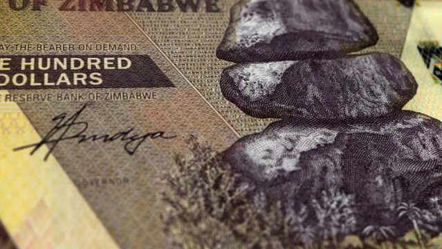 Zimbabwe Zimbabwean Dollar 100 Banknotes, One Hundred Zimbabwean Dollar,Close-up and macro view of the Zimbabwean Dollar, Tracking and Dolly Shots 100 Zimbabwean Dollar banknote Observe and Reserve