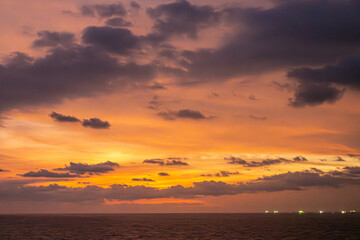 Guatemala, Puerto Quetzal - July 20, 2023: Spectacular sunset skies over Pacific Ocean in front of...