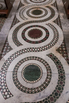 Cosmatesque floor at the central nave of the Basilica of Santa Maria in Trastevere, Rome, Italy