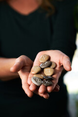 stone runes in a woman's hand