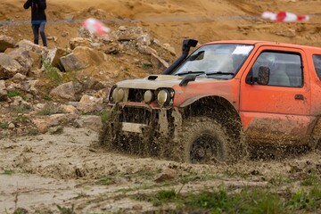 offroad car driving on track in dirt. adventure offroad racing