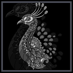 Fototapeta premium Monochrome Peacock bird mandala arts isolated on black background.