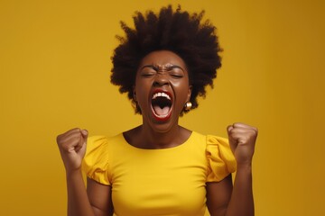 Close-up photo, amazing, dark-skinned lady doesn't believe, screams, happy, hands, fists raised, big victory in competition, isolated yellow bright bright background