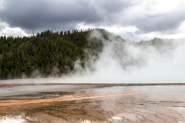 The Grand Prismatic Spring on a cold cloudy winter day in Yellowstone National Park is the largest hot spring in the United States, it is located in the Midway Geyser Basin. Yellowstone, Wyoming