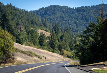 Highway 101, Image shows the highway and the beautiful countryside views on a hot clear day from the mountain to the forest scenery, October 2023