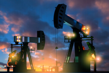 Oil deposit. Petroleum mining derricks at sunset. Landscape with deposit of energy resources. Pumps...