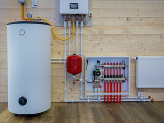 Heating boiler tank. Room with heating equipment. Gas boiler technologies. Heating system country...