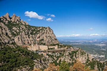 Fototapeta na wymiar Scenic view of Santa Maria de Montserrat Abbey in Catalonia, Spain