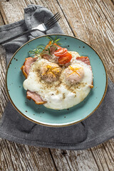 Fried eggs with pork ham.