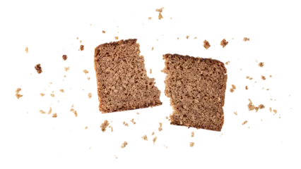 Fototapete Bäckerei Broken slice of dark rye bread with crumbs flying isolated on white