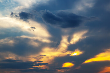Lush colored clouds in the sky before sunset