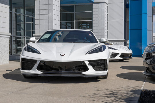 Chevrolet C8 Corvette display at a dealership. Chevy offers the Corvette in 1LT, 2LT, 3LT, and Z06 models.
