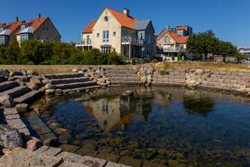 Fototapeta na wymiar A house by a pound in Limhamn