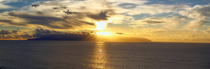 Panoramic sunset over Gomera island, Tenerife, Canaries, Spain