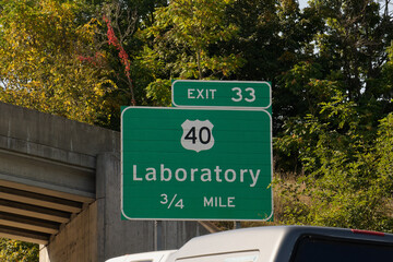 Sign for Exit 33 on Interstate 79 for US 40, Laboratory, Pennsylvania. The unusually named town is...