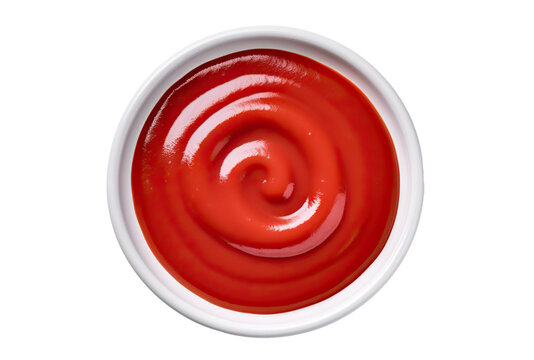 Delicious tomato ketchup in a white ramekin, cut out