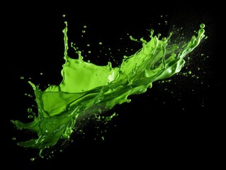 green paint splash on black background