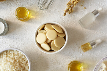 Cocoa butter, essential oils, bees wax pellets and other ingredients for homemade cosmetics
