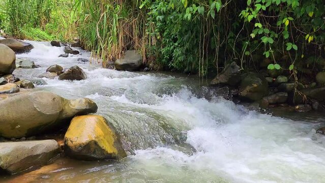 Strong water river crossing the mountain