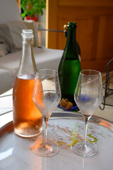 Tasting of grand cru sparkling white wine with bubbles champagne in old champagne house in grand cru wine producer small village Ambonnay, Champagne, France