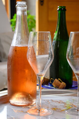 Tasting of grand cru sparkling white wine with bubbles champagne in old champagne house in grand cru wine producer small village Ambonnay, Champagne, France