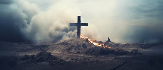 Solitary Cross Amidst Flames. A lone wooden cross stands in a desolate landscape, surrounded by smoke and subtle flames - obrazy, fototapety, plakaty