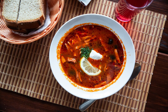 Russian cuisine - solyanka soup with various ingredients