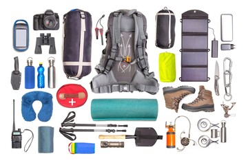 Set of tourist trekking items on white background. Top view of accessories for travel. Equipment for travel and hiking. Survival Items.