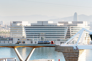 Gasoline tanker on the bridge against modern building