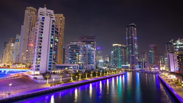 night time illuminated dubai marina traffic famous city bridge top panorama 4k timelapse uae
