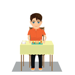 boy eating at the table