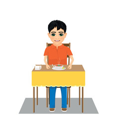 boy eating at the table