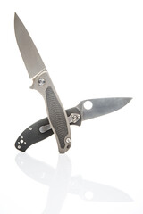 two folding knives on a white background. item for tourism and survival.