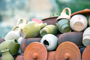 stacked together broken clay pots
