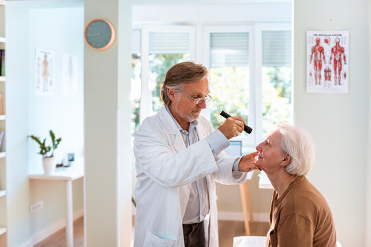 Senior woman having an eye exam in the doctors office