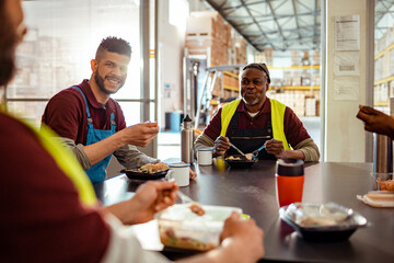 Warehouse Workers Taking a Lunch Break Together