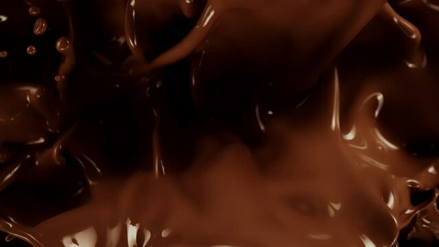 Super Slow Motion Shot of Splashing Melted Chocolate Background at 1000 fps.