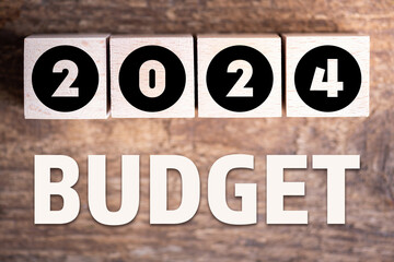 Budget 2024 new year on wooden blocks and office business concept background. 2024 Budget planning and allocation concept concept. 2024 New year resolutions, goals