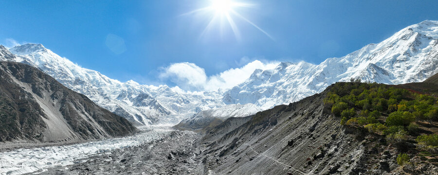 Panorama white glacier with "Nanga Parbat" the 9th highest peak in the world, called "Killer Mountain". Landmark in northern Pakistan. Beautiful scenery of high mountains with trail to base camp