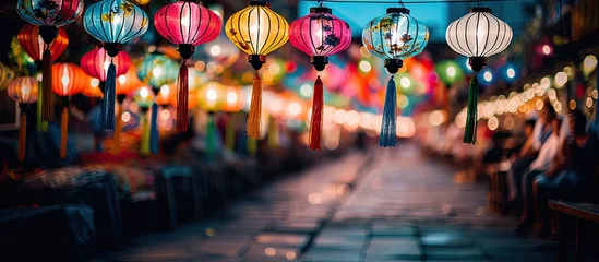 Foto op Plexiglas At the night market during the Chinese New Year celebration in China vibrant hues of green blue orange red and pink illuminated the surroundings with hanging lamps and art showcasing the be © TheWaterMeloonProjec
