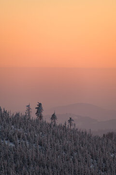 Winter landscape with snow capped mountain under sunlight. Popular hiking and travel place. © fesenko