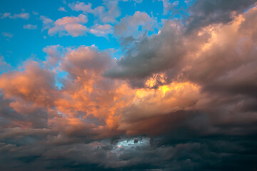 Lush colored clouds in the sky before sunset