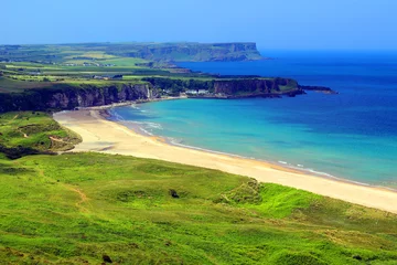 Tuinposter The Causeway Coast is famous for an awful lot of things. Generation after generation of visitors flocked to the immense beaches at Portrush and Portstewart. © Daniel Meunier